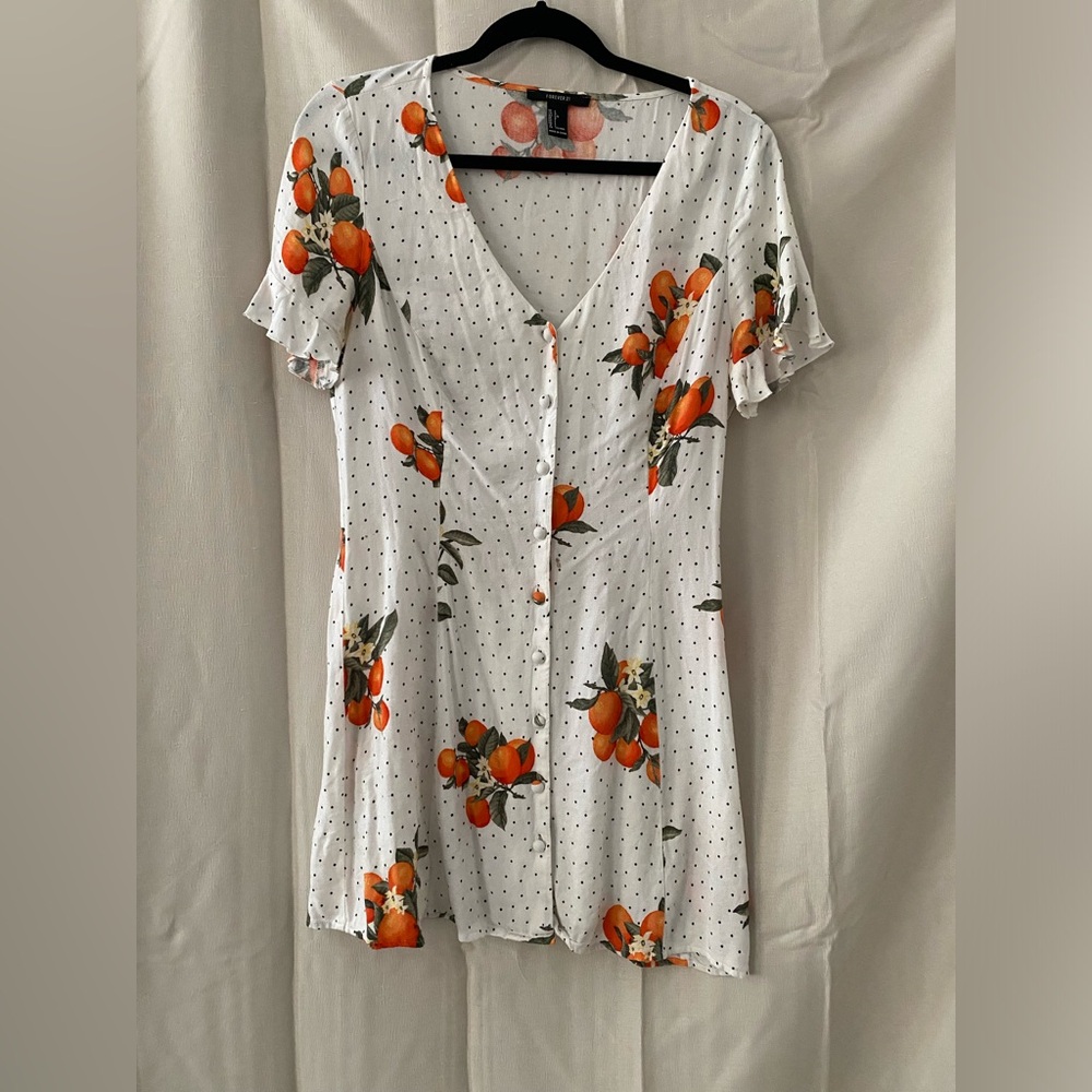 White dress with orange print